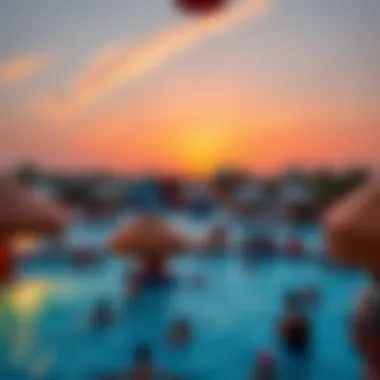 Stunning sunset view over a popular aqua park filled with visitors