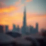 A stunning view of Burj Dubai against a vibrant sunset.