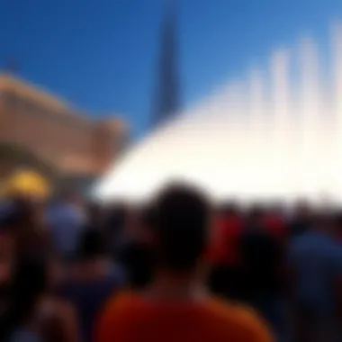 Crowd enjoying the fountain show with the Burj Khalifa in the background