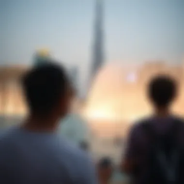Visitors Experience at Dubai Fountain Visitors enjoying the Dubai Fountain show with Burj Khalifa in the background