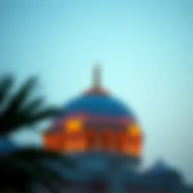 A mosque's minaret with the Fajr call to prayer
